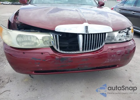 2002 Lincoln Town Car Cartier/Cartier Prem. z USA, uszkodzony, nr VIN 1LNHM83W52Y626407